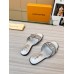Louis Vuitton LV Isola Flat Slides In Silver Metallic Leather