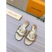 Louis Vuitton LV Isola Flat Slides In Gold Metallic Leather