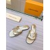 Louis Vuitton LV Isola Flat Slides In Gold Metallic Leather