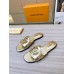 Louis Vuitton LV Isola Flat Slides In Gold Metallic Leather