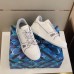 Louis Vuitton Men's LV Trainer Sneakers In White Calfskin Louis Vuitton Men's LV Trainer Sneakers In White Calfskin