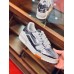 Louis Vuitton Men's LV Trainer Sneakers In Silver Metallic Leather